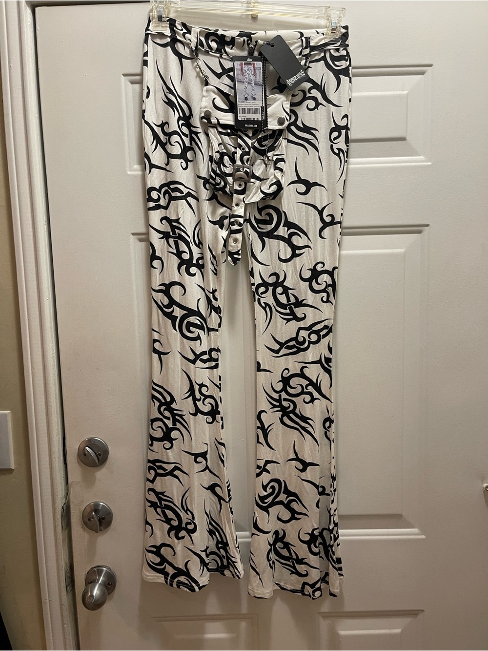 Darker wavs kick drum tattoo print flare pants. Sz M